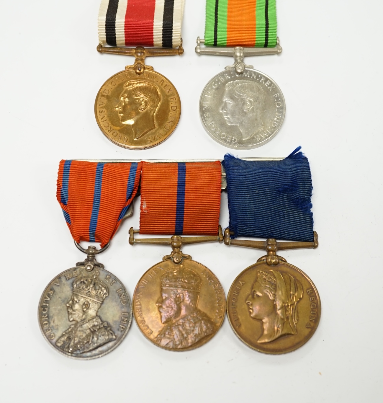 A Metropolitan police medal group awarded to James W. Sidders comprising of three commemorative medals; the 1887 Golden Jubilee medal, the 1902 Edward VII Coronation medal and the 1911 George V Coronation medal, together